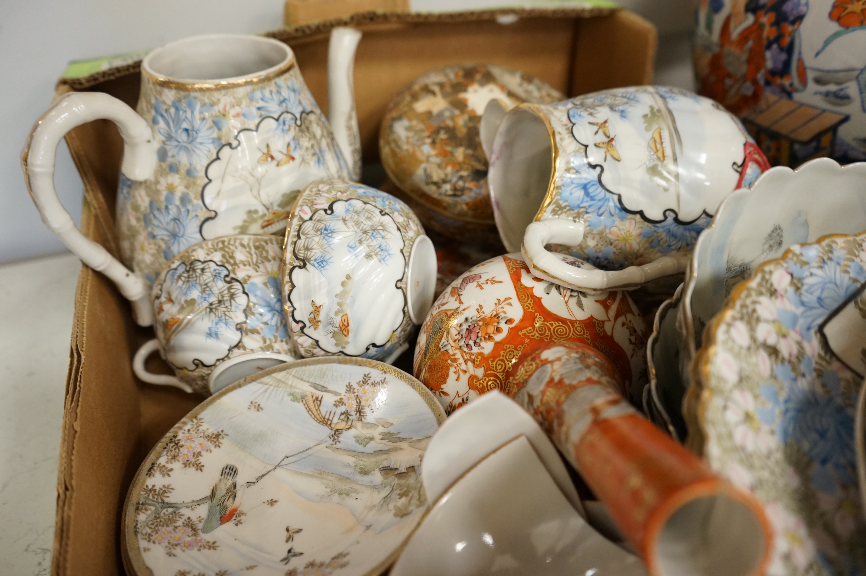A large collection of Chinese and Japanese ceramics to include a pair of Satsuma vases, a Satsuma jar and cover and Imari wares